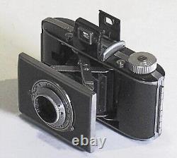 Kodak Flash Bantam miniature (but heavy) folded pocket camera