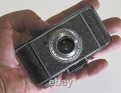 Kodak Flash Bantam miniature (but heavy) folded pocket camera