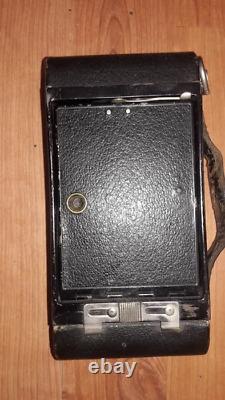 Vintage camera with folding fur Kodak. WWII. WW2